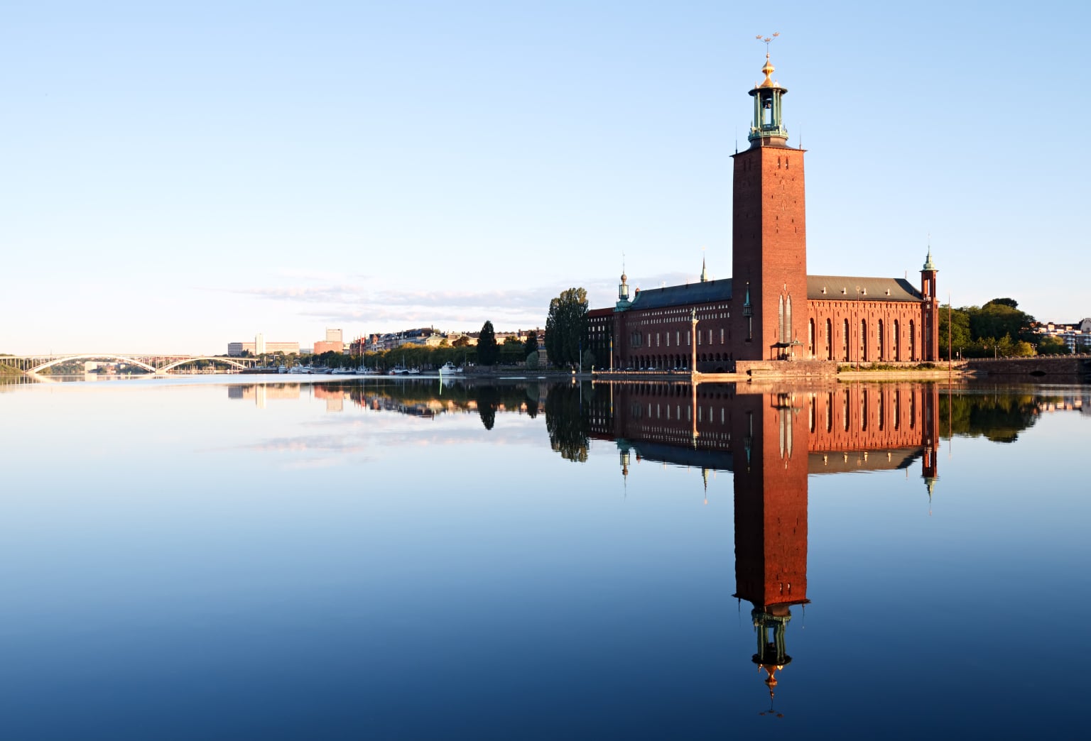 Stockholm City Hall with reflection on water Söderbergavägen 23